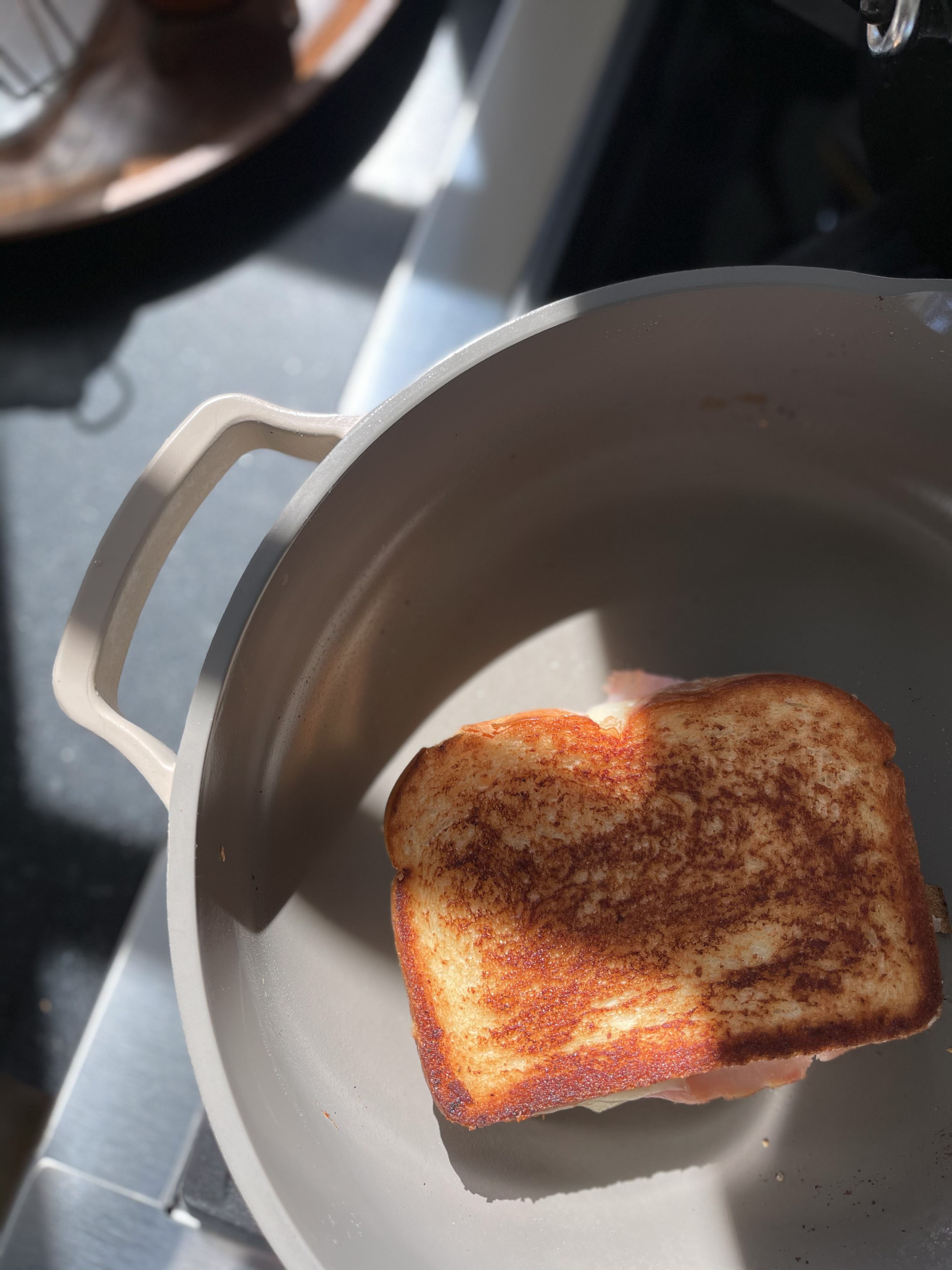 The Always Pan from Our Place is perfect for busy moms making grilled cheese sandwiches at lunchtime