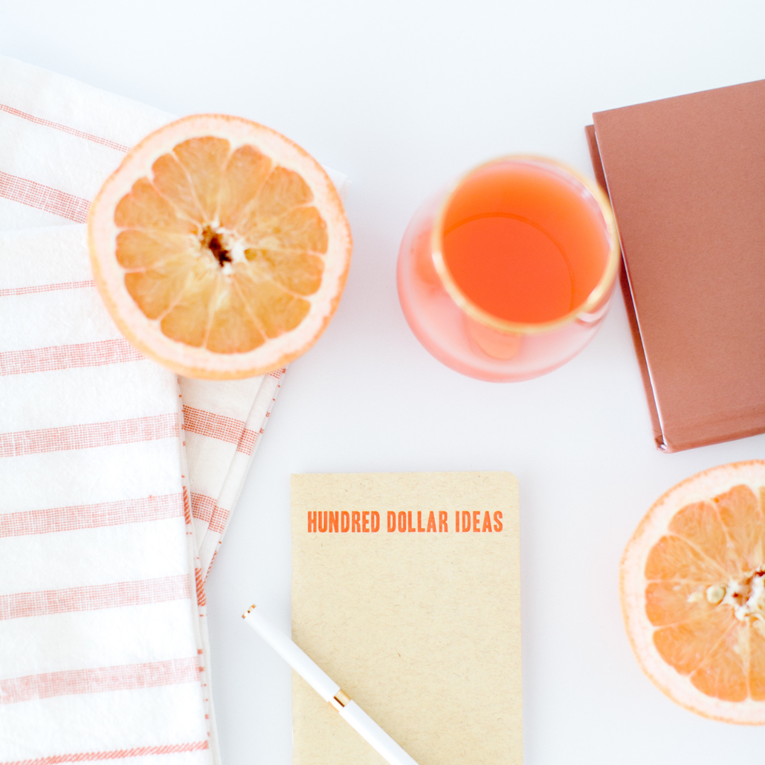 Citrus, juice + a journal to reflect planning for what to do during summer break at home with littles.